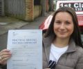 Mirela with Driving test pass certificate